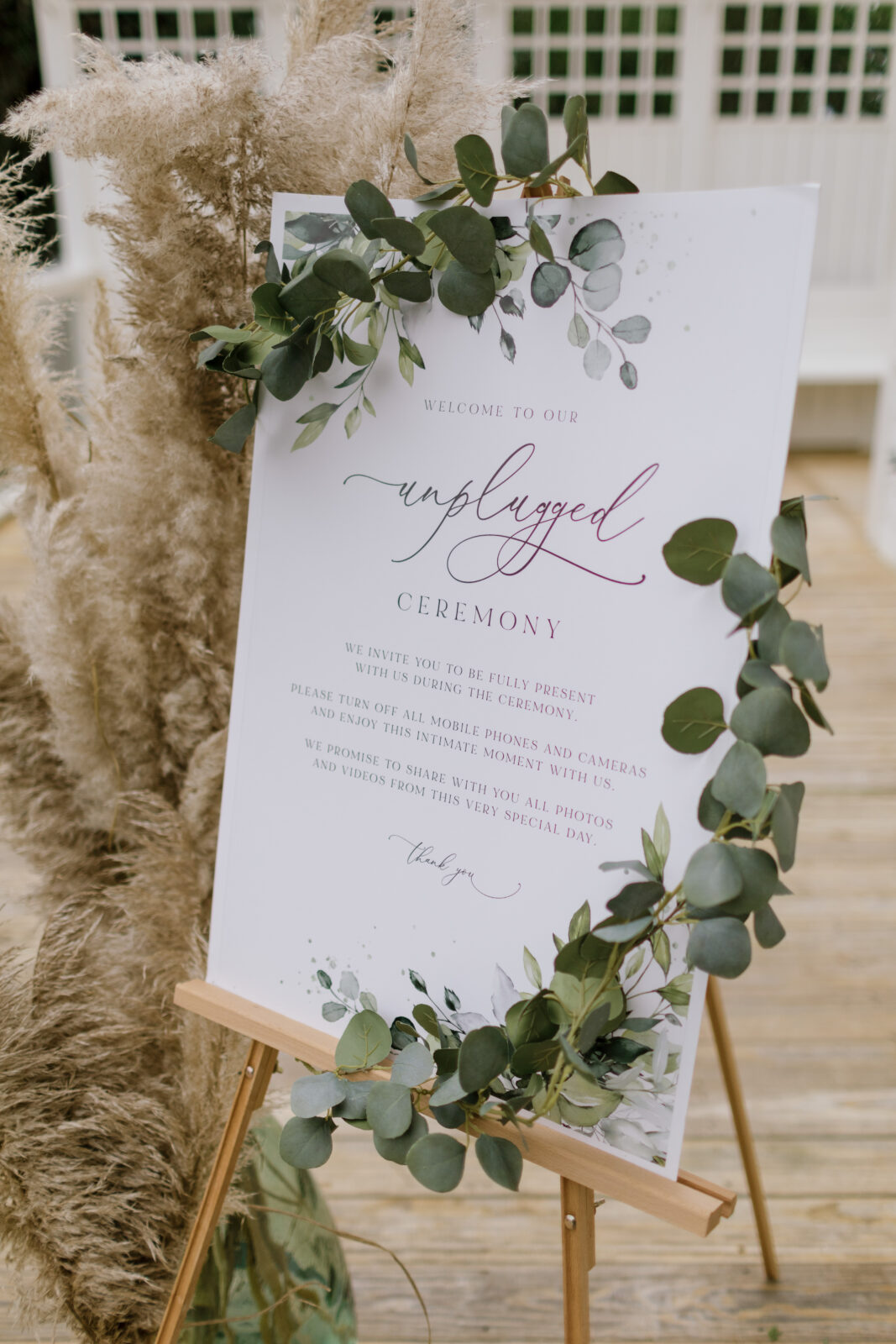 wedding unplugged sign with script and eucalyptus